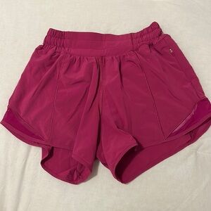 Hot pink lululemon hotty hot shorts size 2 4 inch/long line